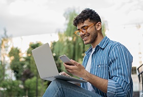 Male student on laptop